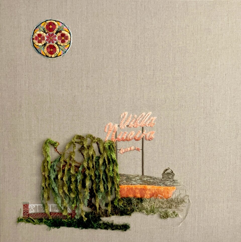 lush green layers of vines cover a barrier next to a sign that reads villa nueva. a floral motif rises in the sky above