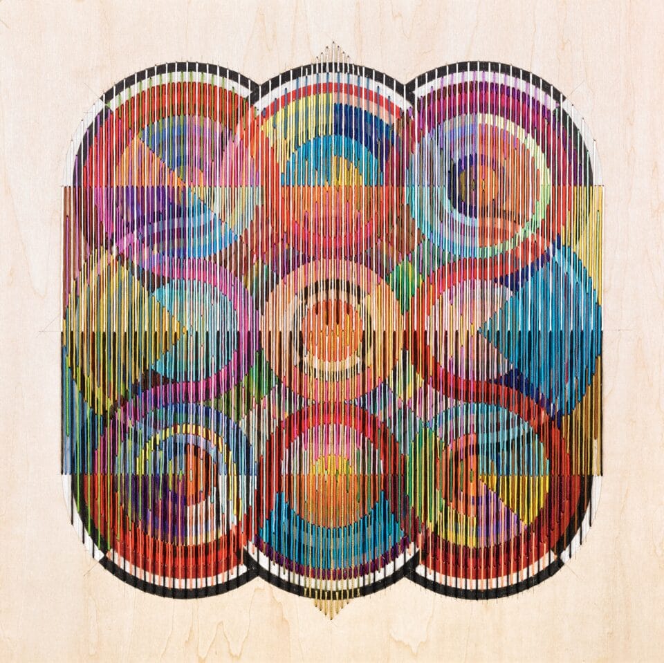 an abstract, geometric thread composition on a wood panel