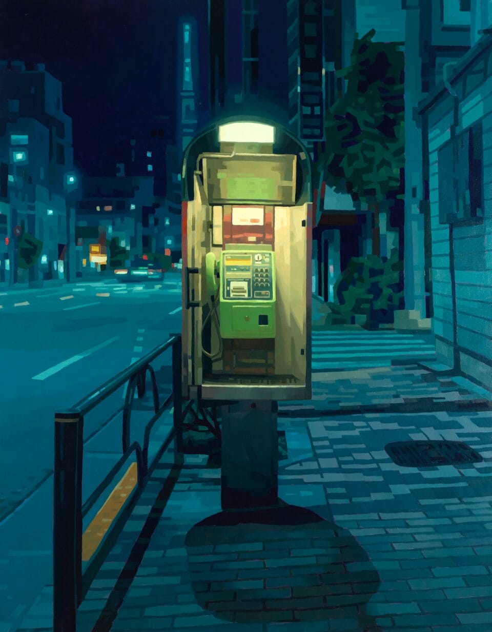 a payphone illuminates a dark street