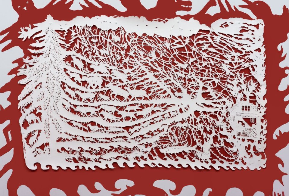 a large-scale horizontal composition of botanic motifs, animals, trees, and a house made of cut paper on a red background