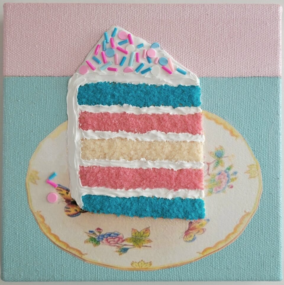 a relief of a slice of layer cake on a square canvas, with embroidery details that resemble the texture of multicolored sponge