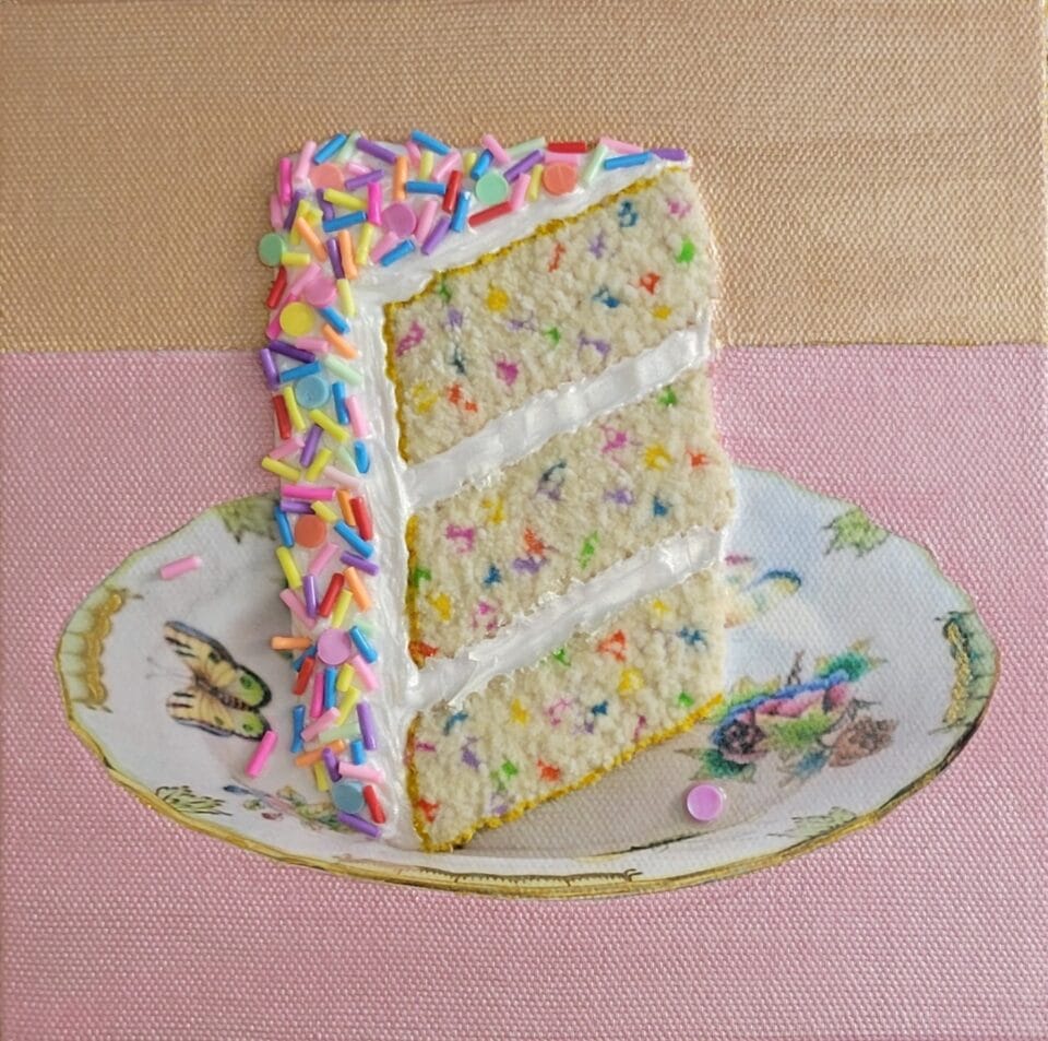 a relief of a slice of layer cake on a square canvas, with embroidery details that resemble the texture of confetti sponge