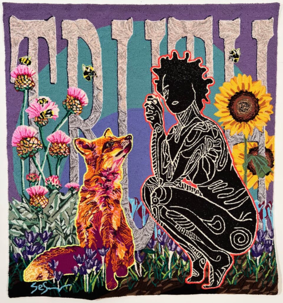 a hand-tufted embroidery composition of a Black woman crouched down next to a fox, with sunflowers and thistles on either side and the word "TRUTH" written large enough to fill the entire background