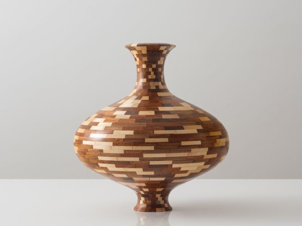 a wooden vessel made of small pieces of wood stacked together