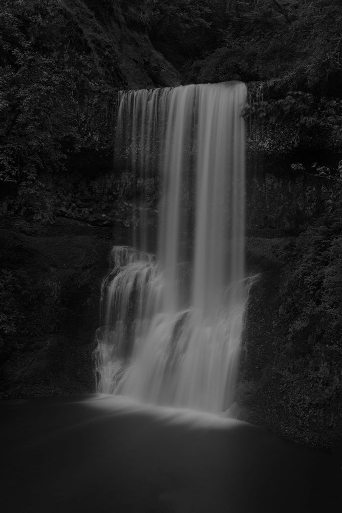 Ethereal Waterfalls Cascade Across Darkened Landscapes in Jonathan Knight’s Photos