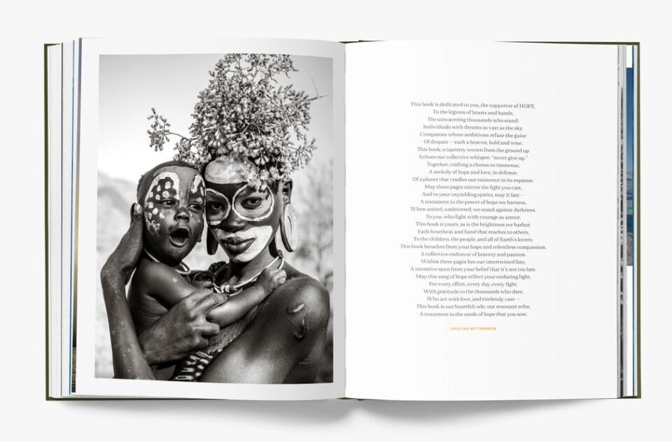 a spread from the book 'HOPE with a black-and-white photo on the left page of an Indigenous Black woman with face paint and and a floral headdress on, holding her young baby who also wears face paint
