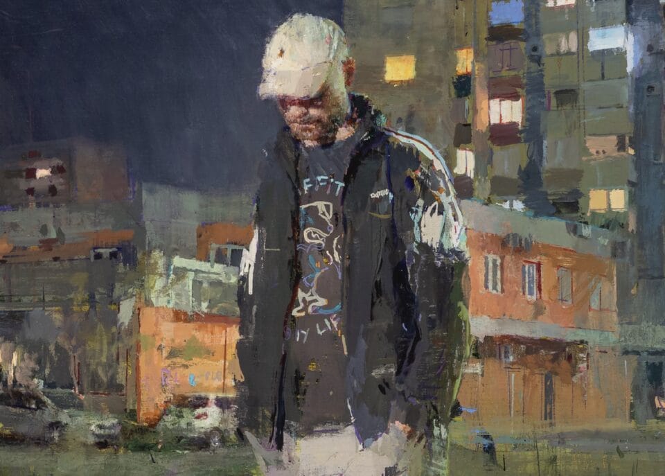 a detail of an oil painting of a man in a hat and jacket with his head tilted down, with buildings in the background